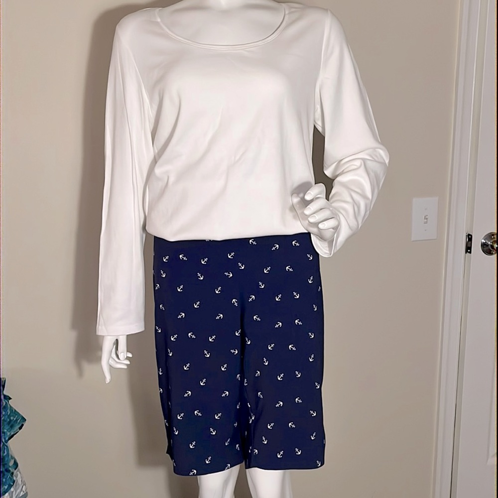 Navy pull-on Bermuda length shorts size 18W and white long sleeve tee.